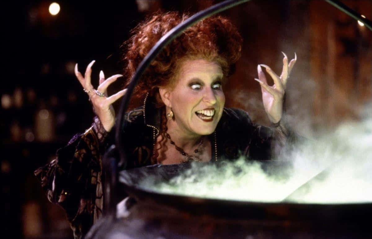 A Woman With Red Hair And A Pot Of Steam
