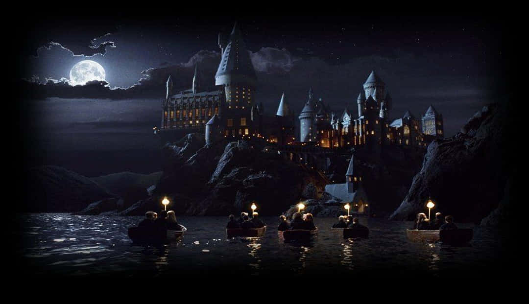 Hogwarts Castle is a magical residence located in the British countryside Wallpaper