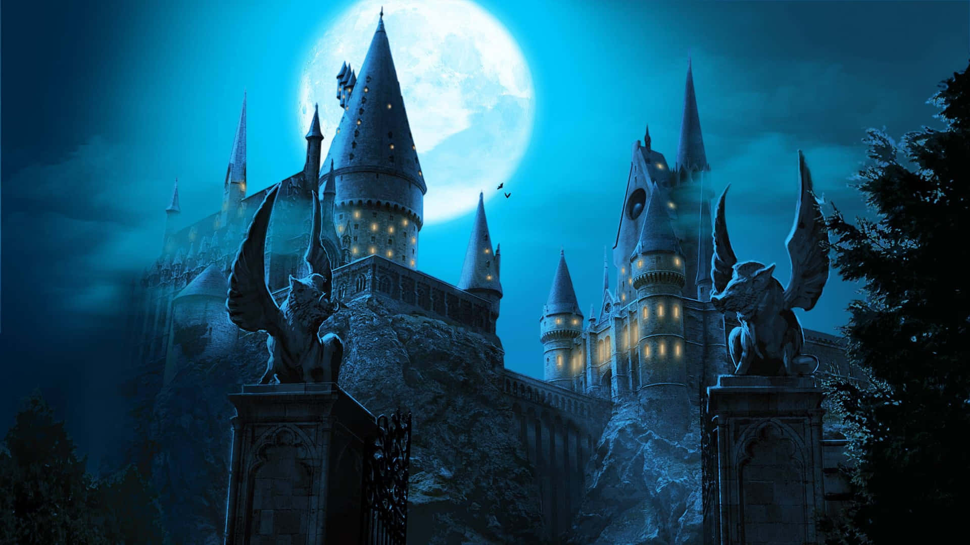 Castillode Hogwarts En Temporada, Iluminado En La Nieve. Fondo de pantalla