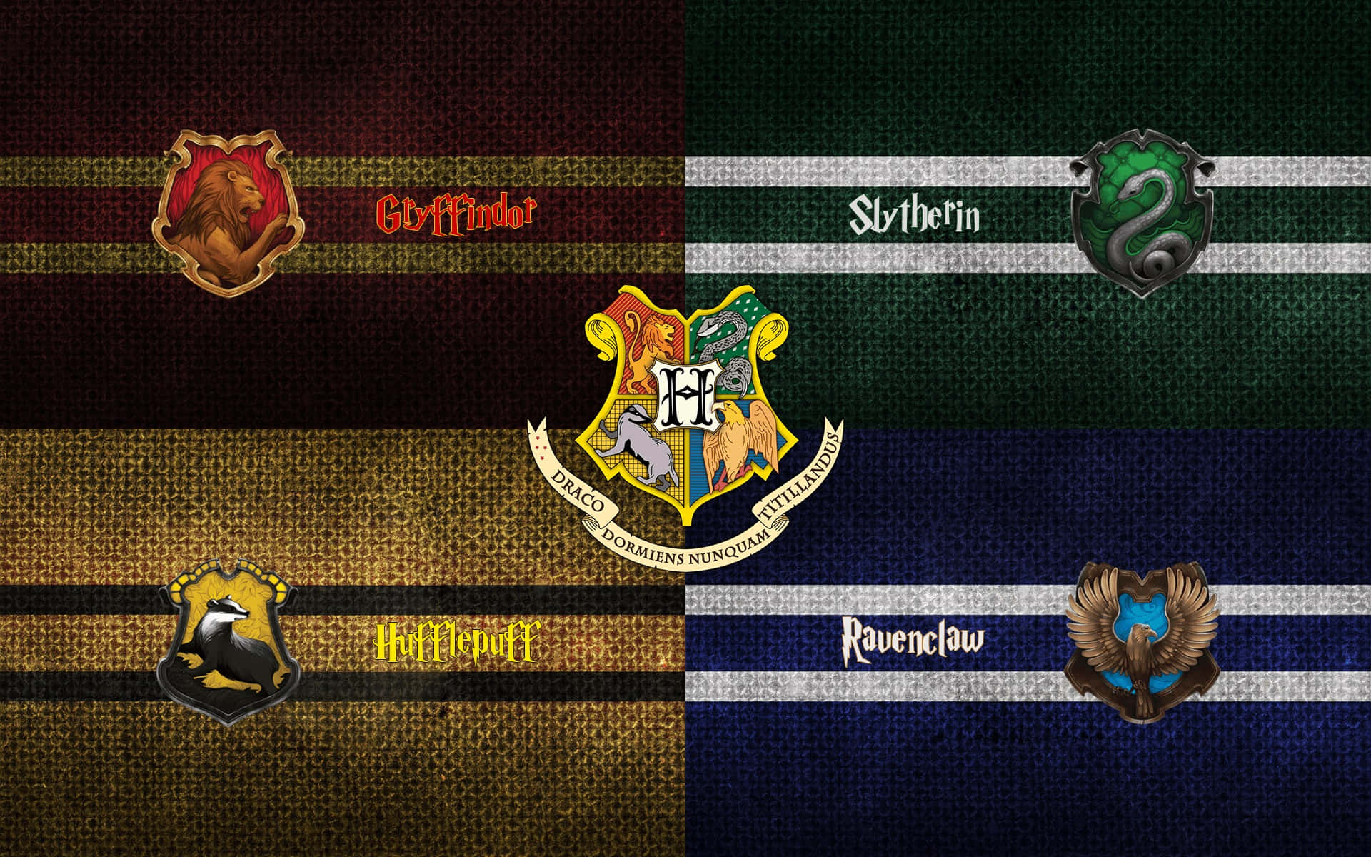 Majestic Hogwarts Crest Displaying the Houses of Hogwarts Wallpaper