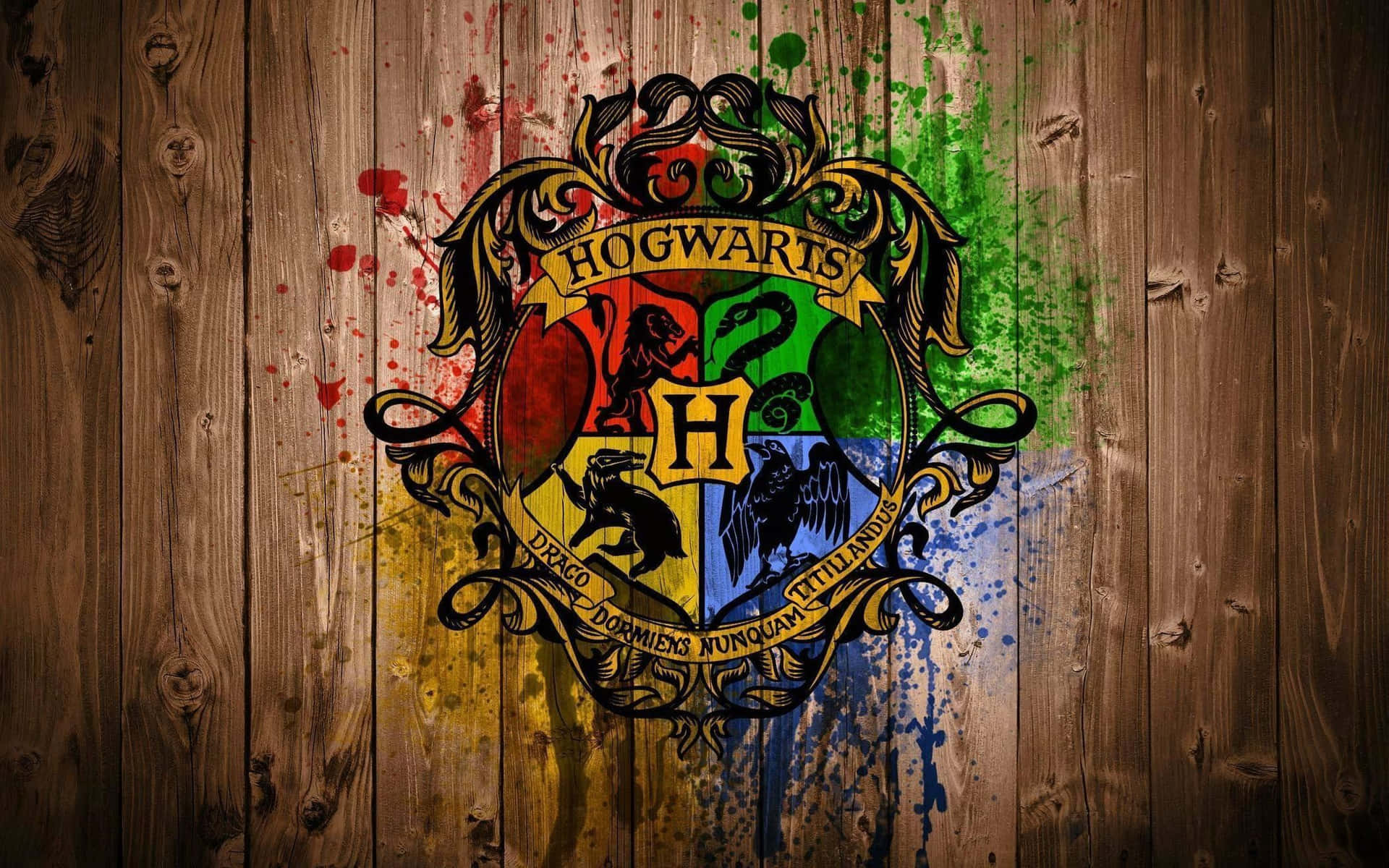 The Hogwarts Crest - A Magical Symbol of the Wizarding World Wallpaper