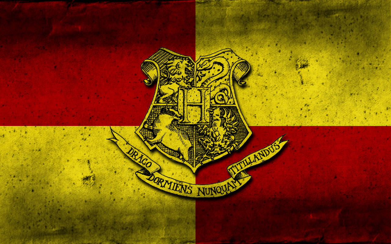 Hogwarts Crest Against Gryffindor Grid Background Wallpaper
