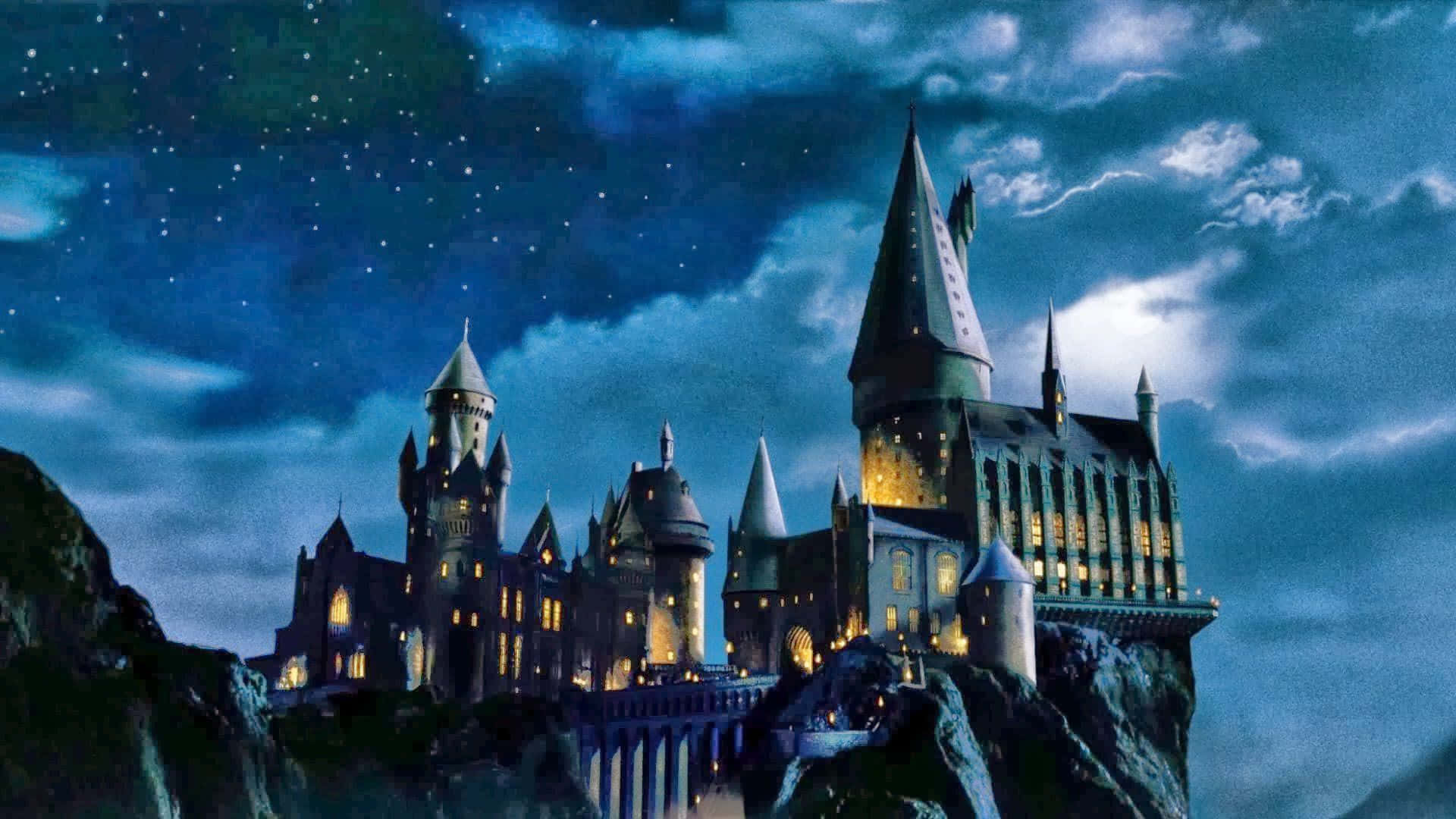 Hogwarts slot om natten med stjerner i himlen Wallpaper
