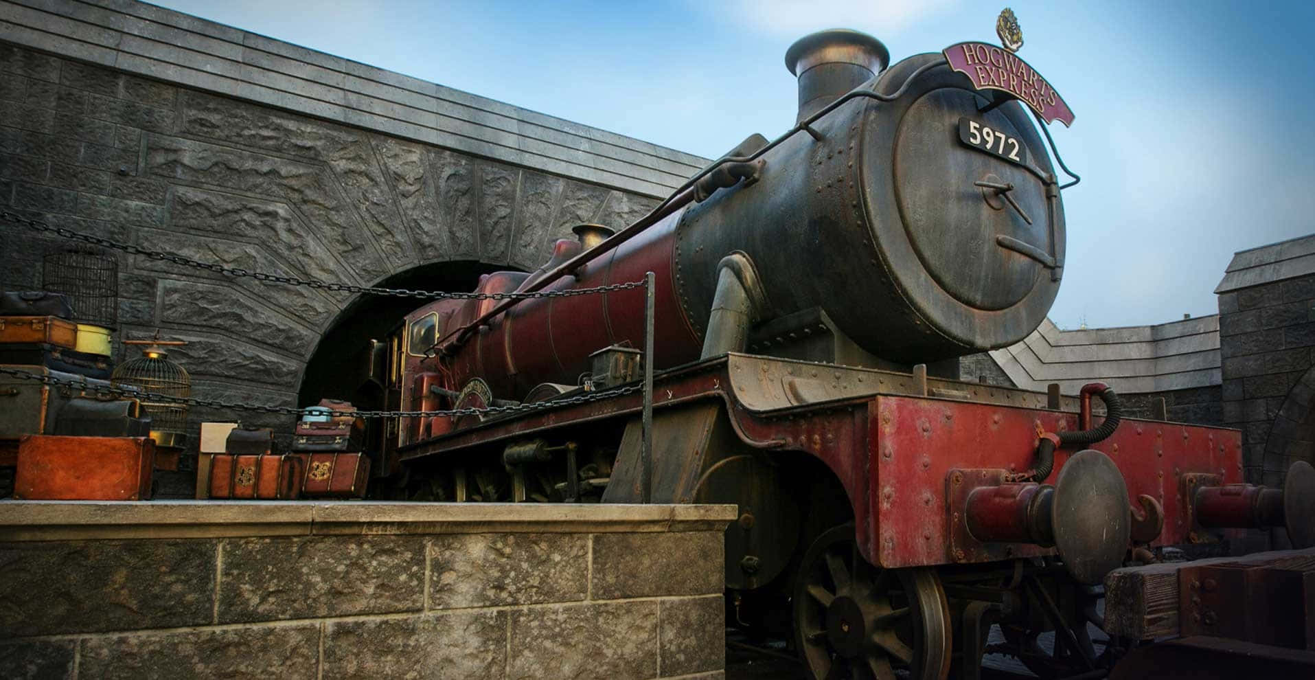 Hogwarts Express train on the platform at Hogsmeade Station Wallpaper