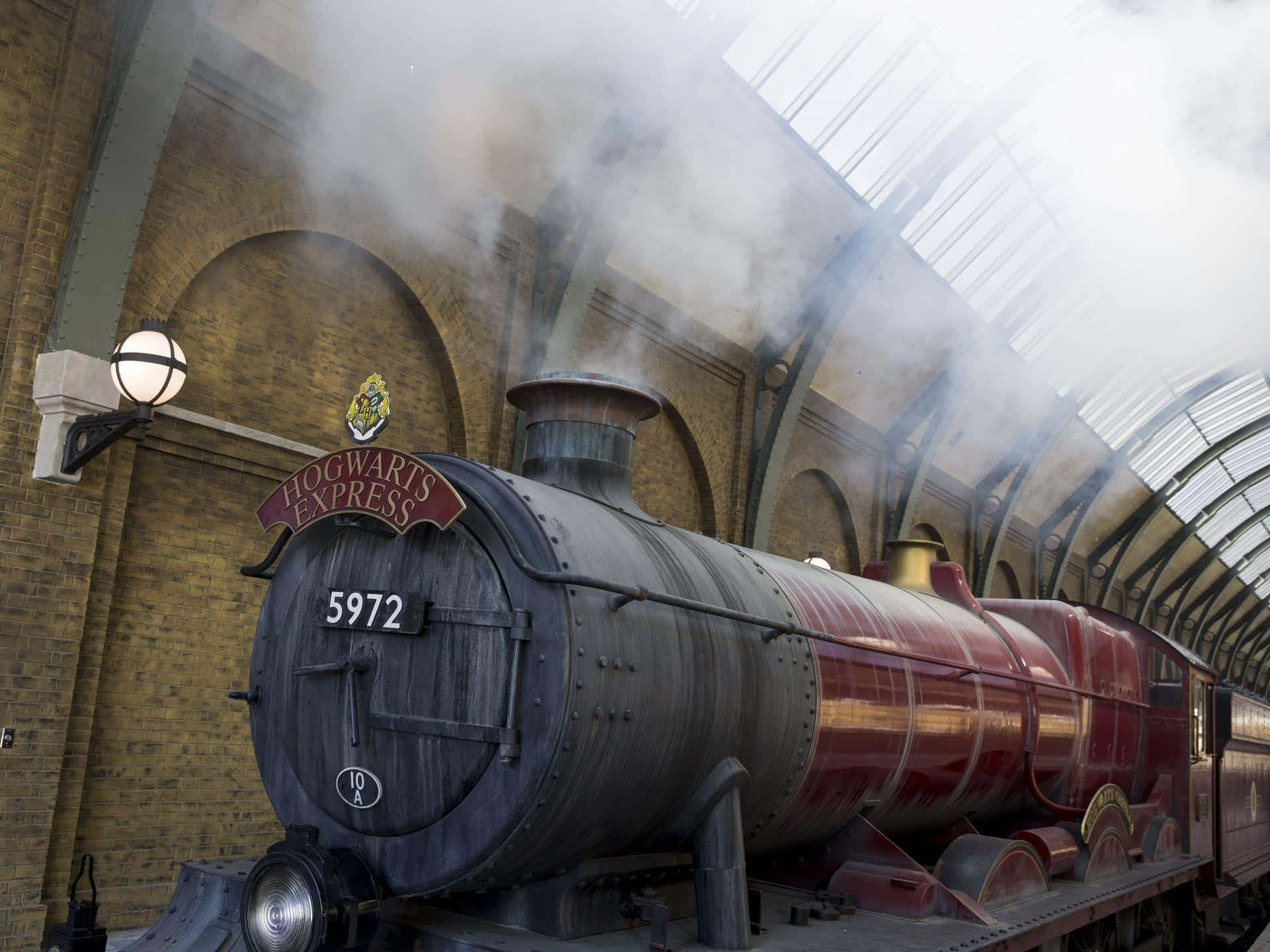 Captivating Hogwarts Express on a magical journey Wallpaper