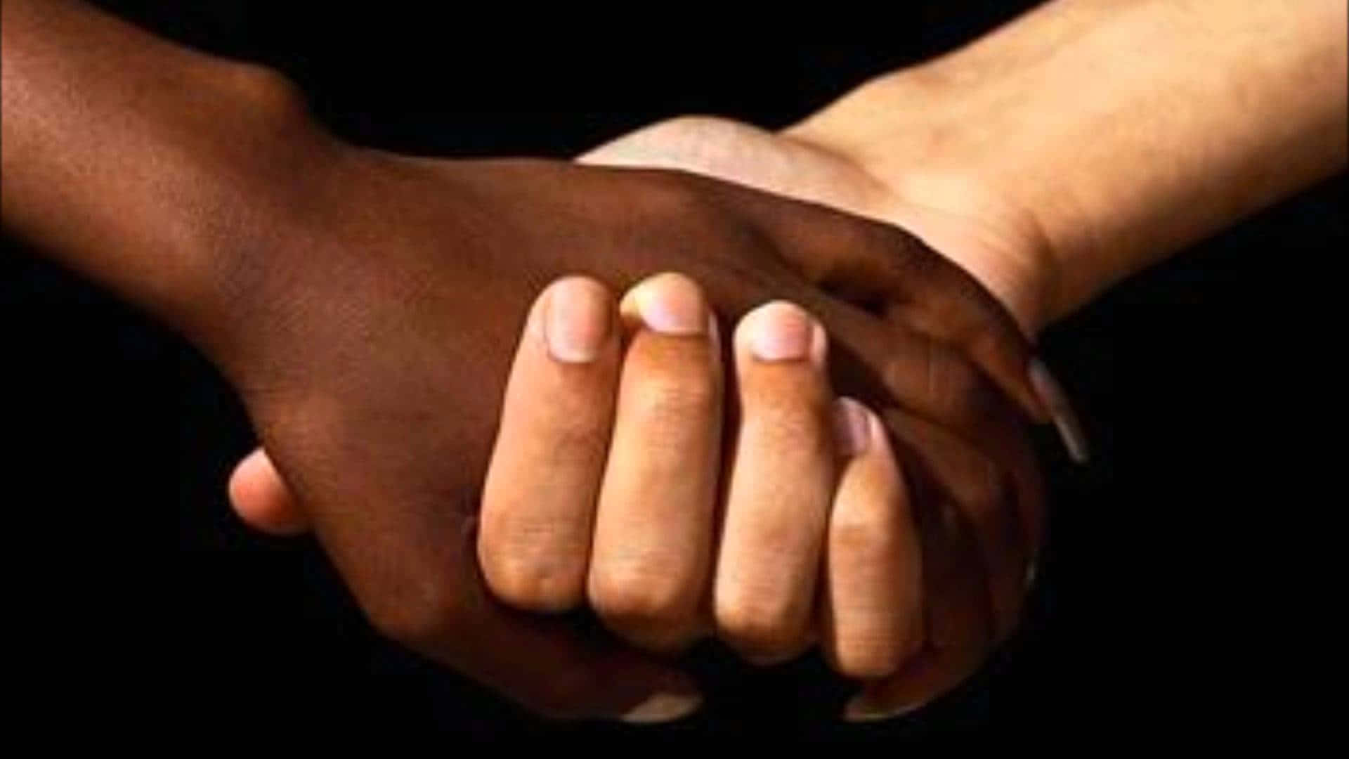 Holding Hands Interracial Couple Wallpaper