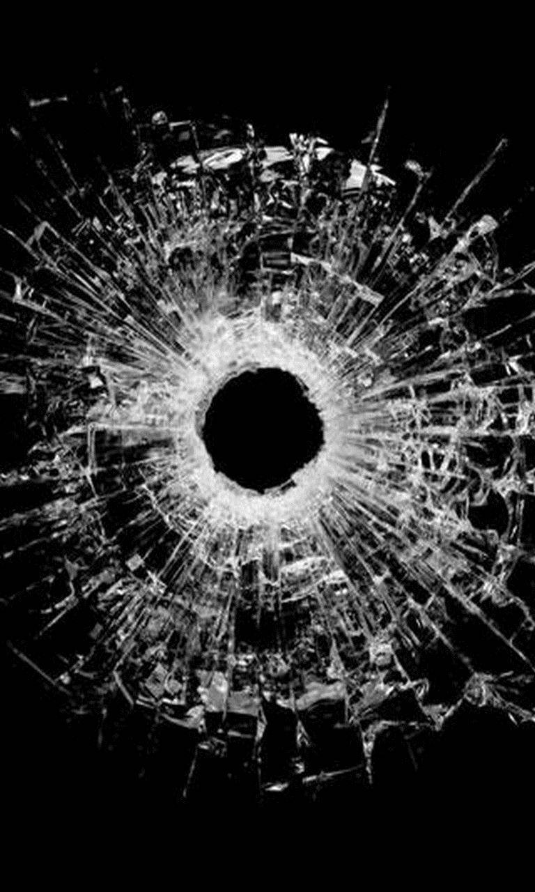 Hole On Cracked Screen Wallpaper