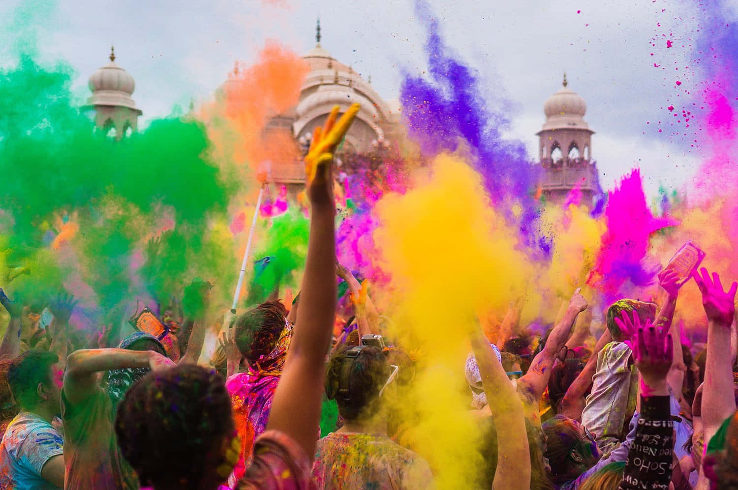Celebrate Holi with Friends and Family Wallpaper