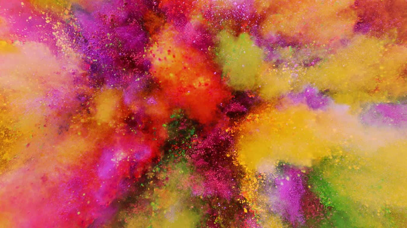 colorful powder is being thrown into the air