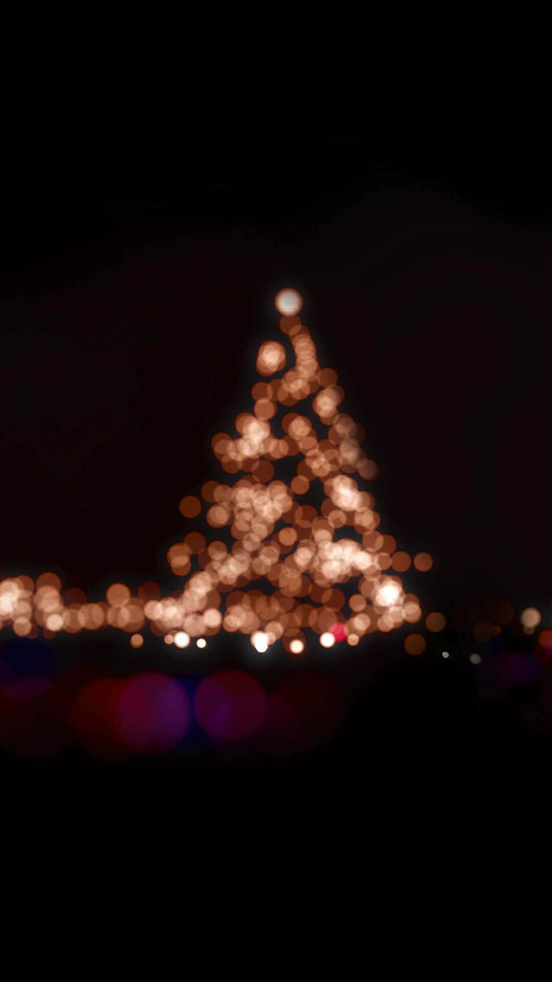 Blurry Christmas Tree Holiday iPhone Wallpaper