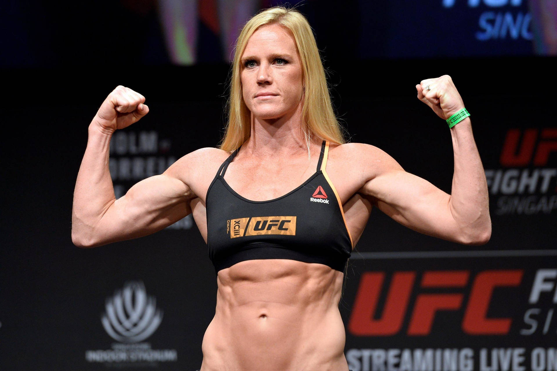 Holly Holm Abs And Biceps Wallpaper