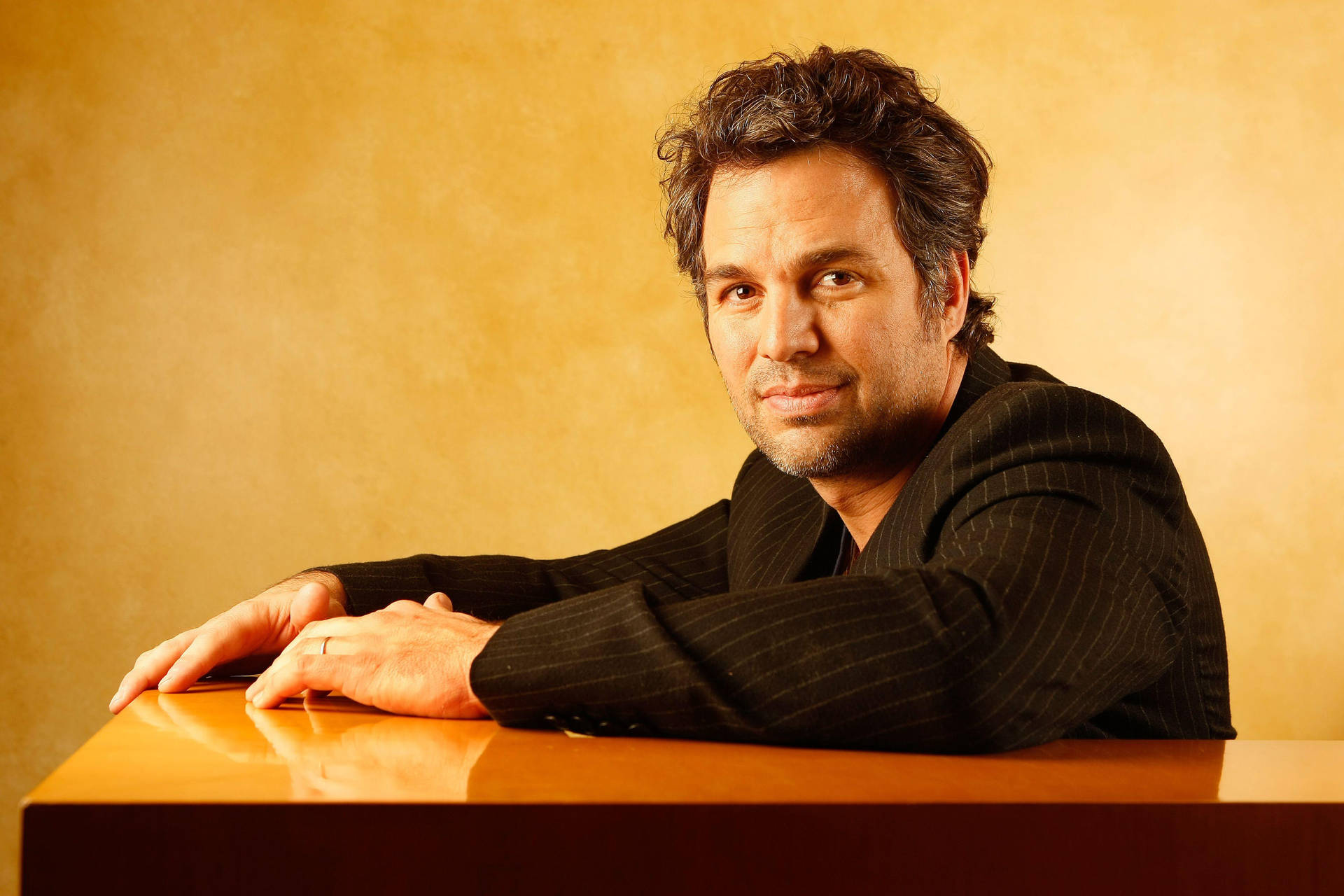 Hollywood Actor Mark Ruffalo In A Pensive Moment Wallpaper