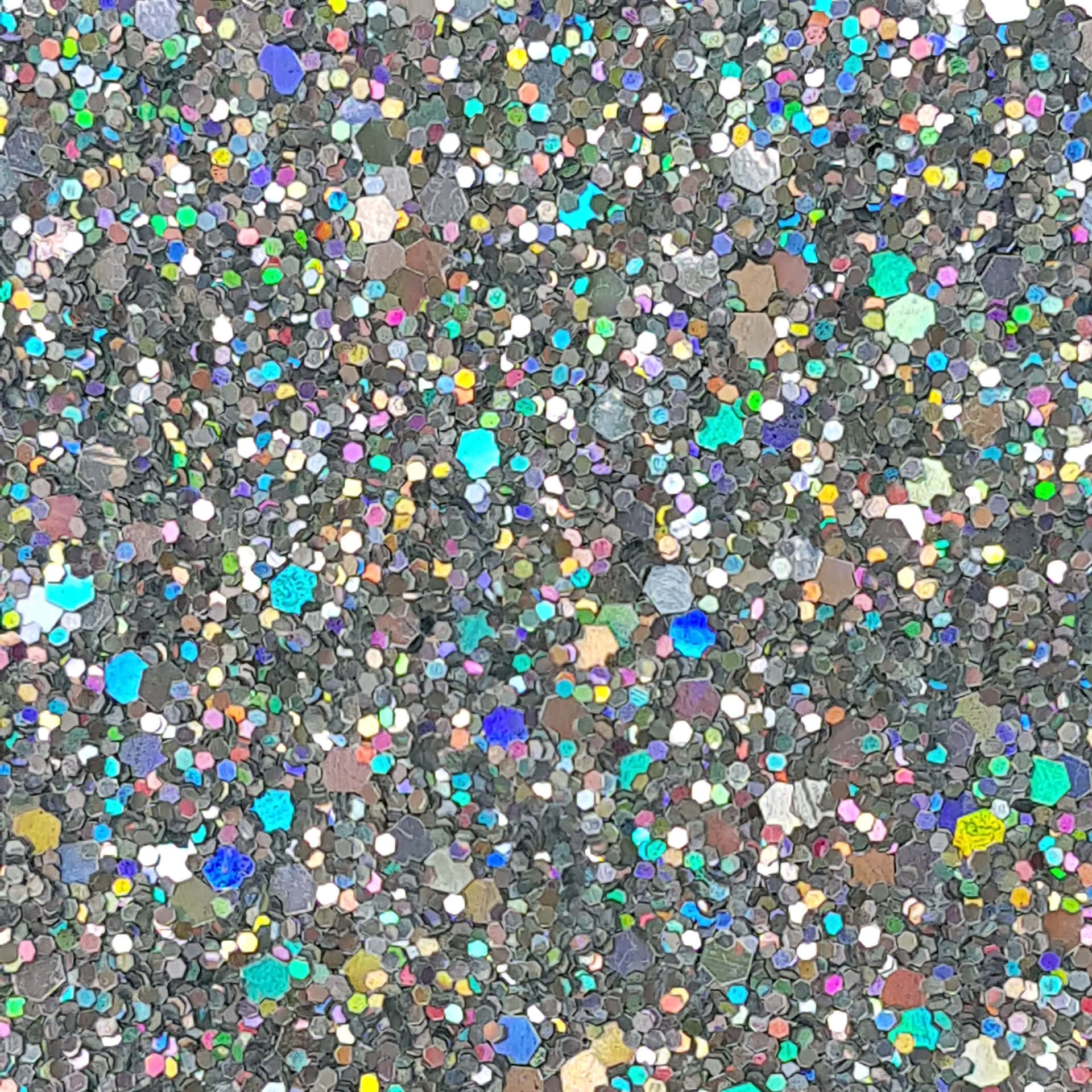 a close up of a colorful glittery surface