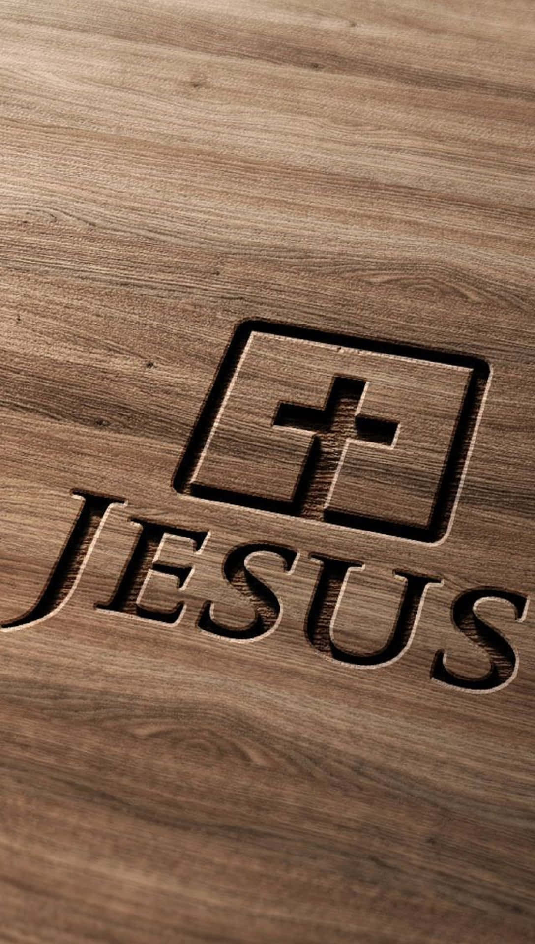 Jesus Logo On A Wooden Table