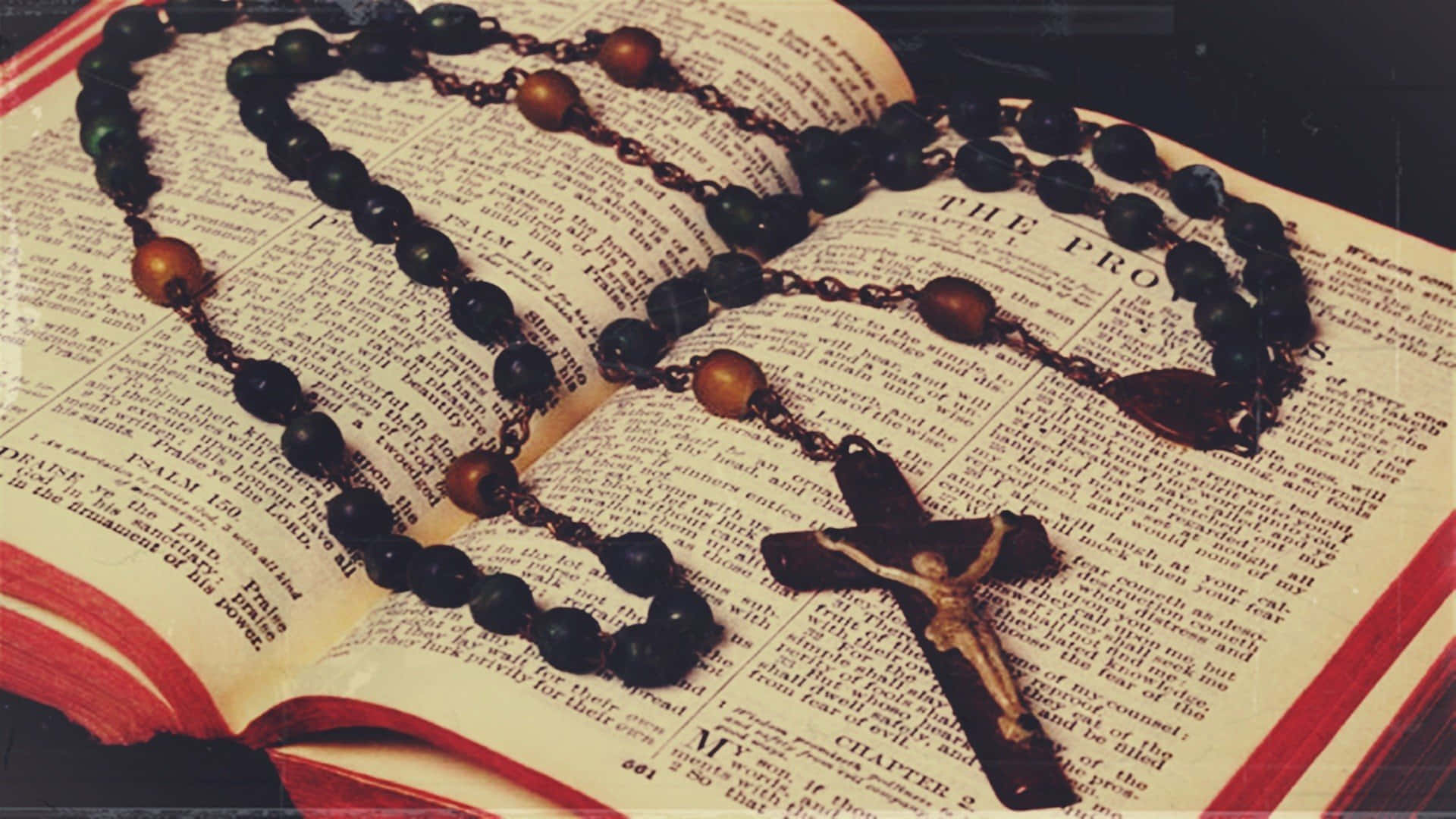 Holy Bible With Black Rosary Wallpaper