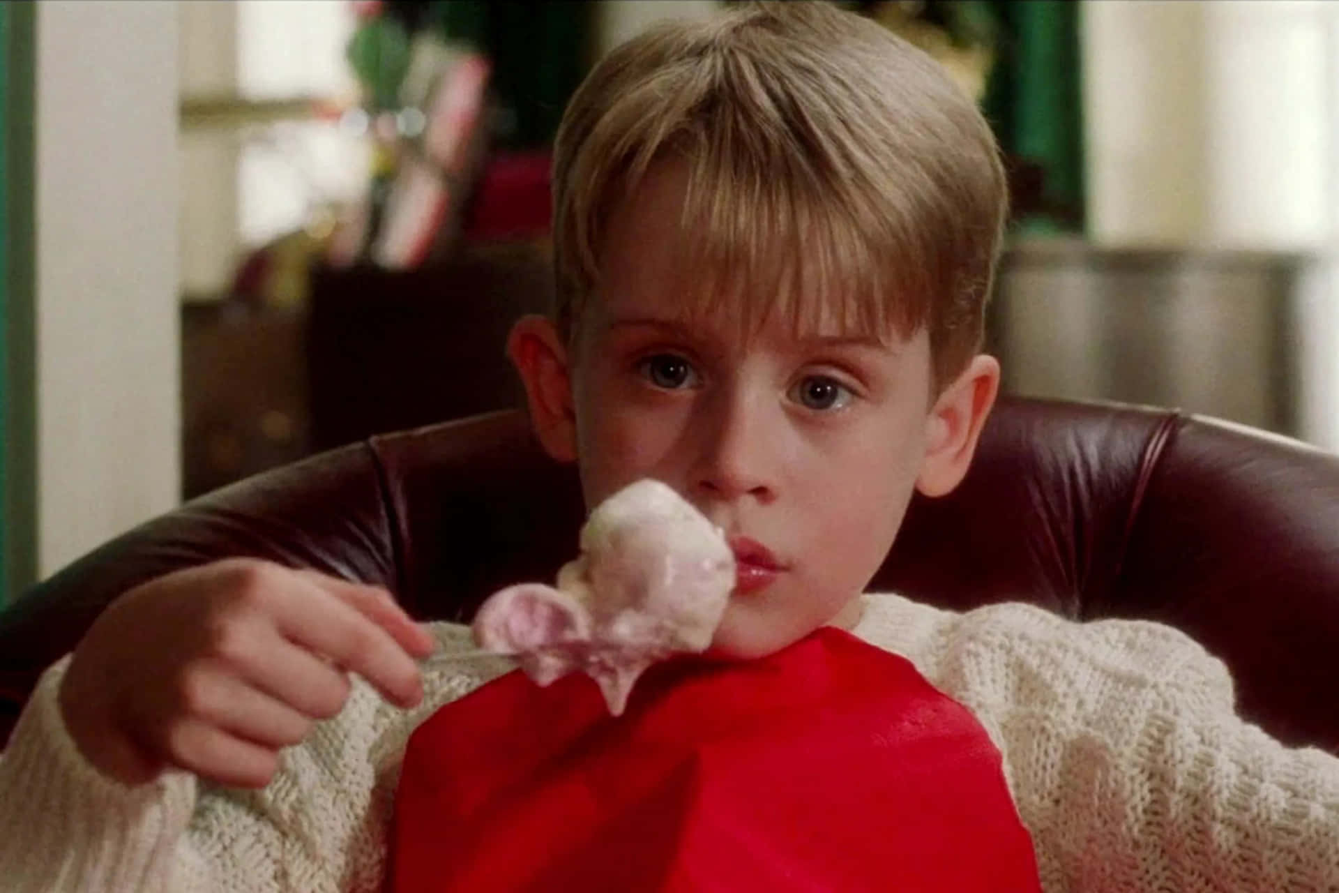 A Young Boy Eating A Ice Cream Cone