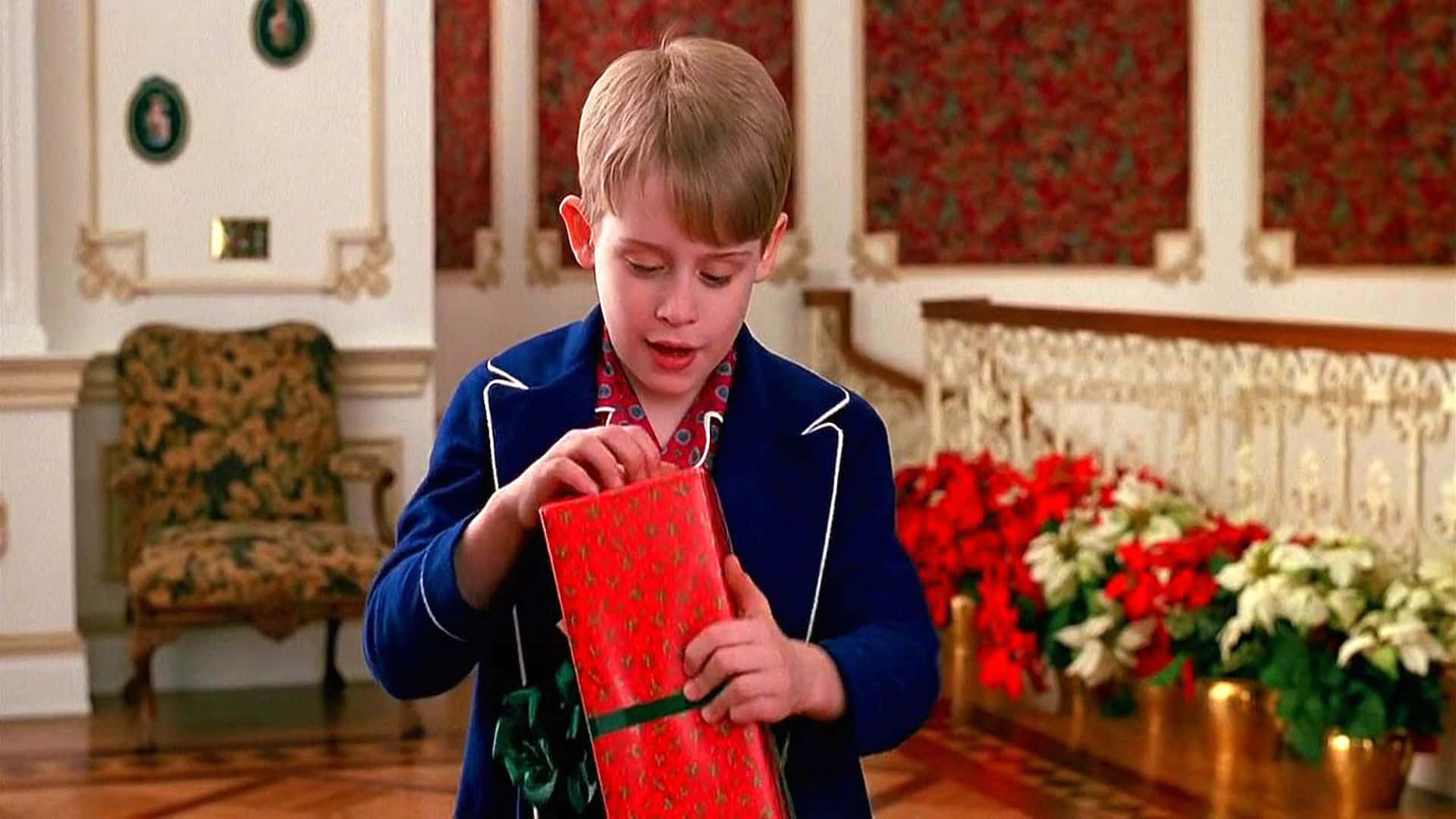 Kevin McAllister defends his home against robbers in 'Home Alone'.