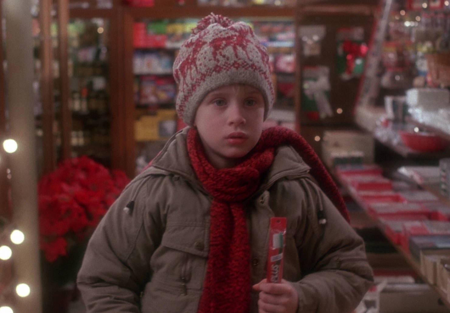 Home Alone Kevin With Candy Bar Wallpaper