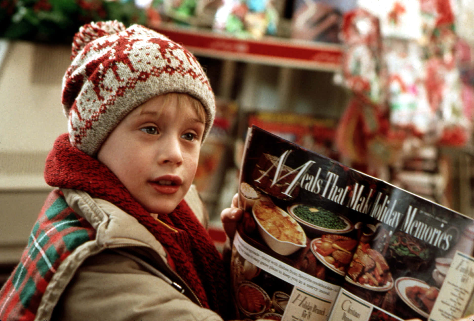 Kevin McCallister happily exclaims in his iconic pose from Home Alone