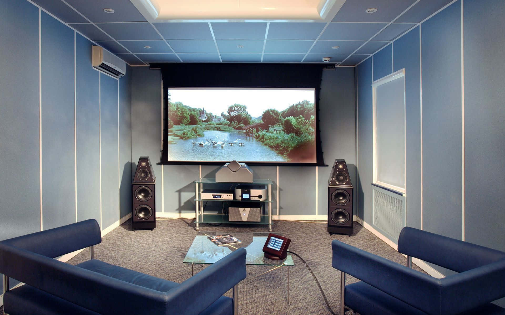 Enjoying a Movie Night at Home with a Home Cinema Wallpaper