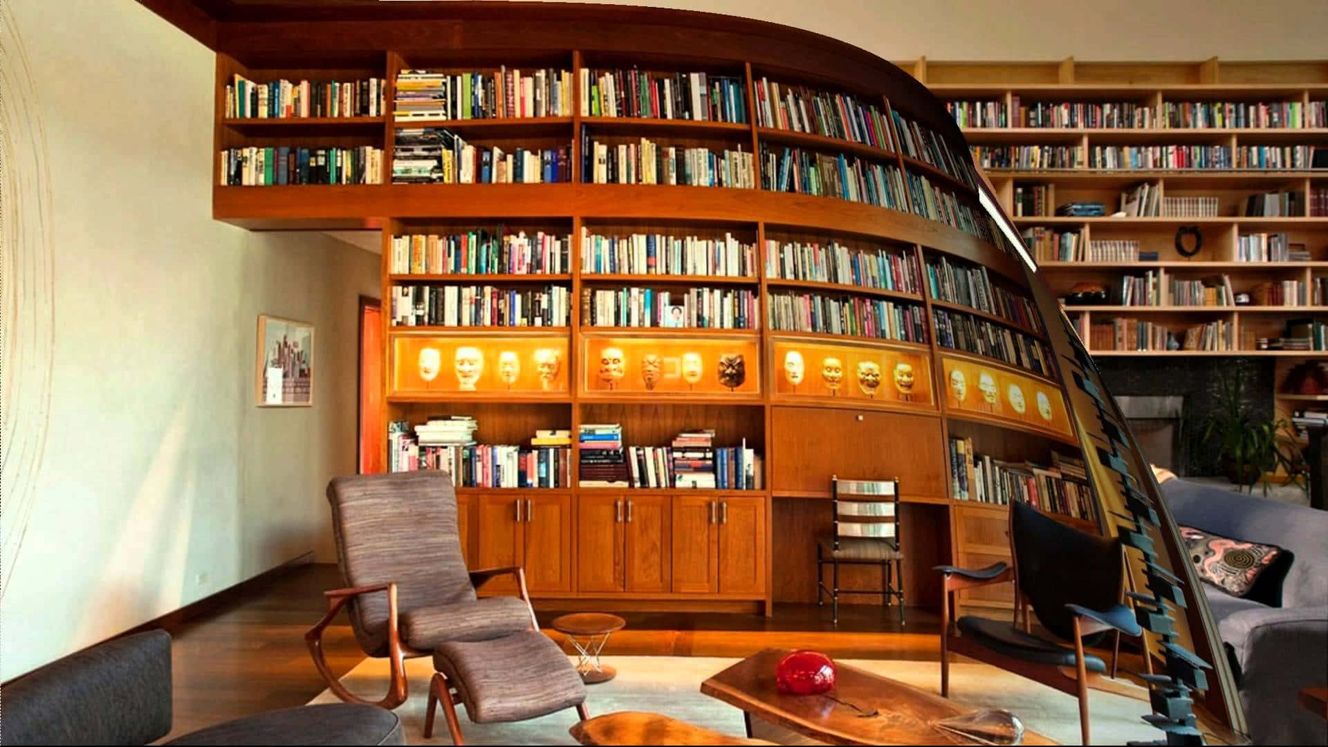 Häuslichebibliothek Mit Großem Bücherregal Wallpaper