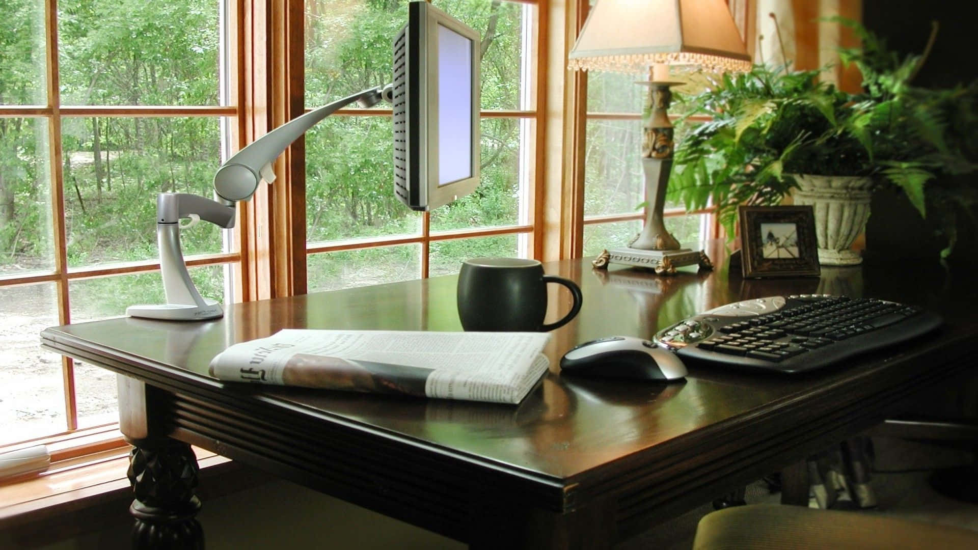 Home Office With A Spacious Desk Wallpaper