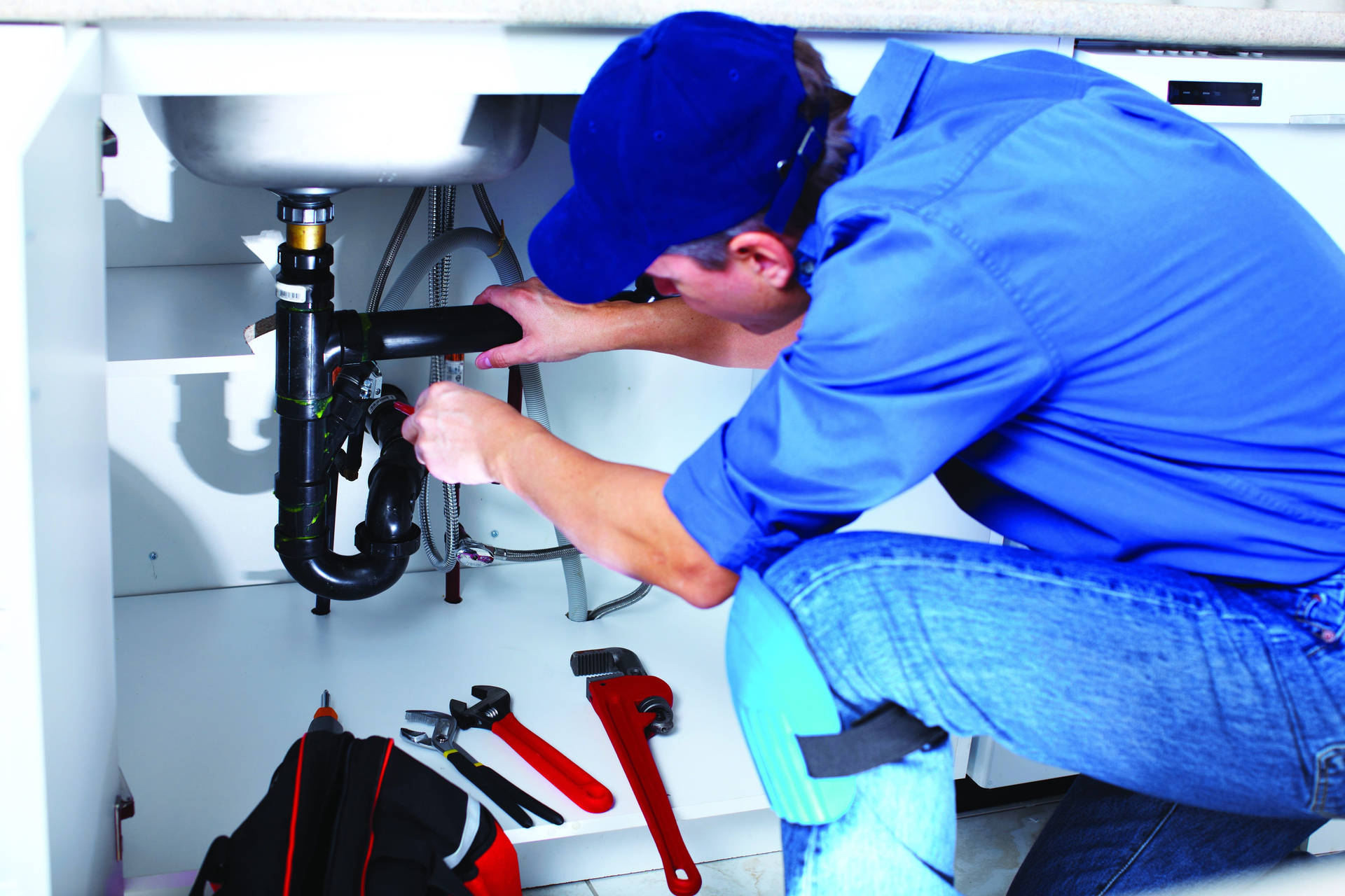 Home Service Plumber Pipe Installation Wallpaper