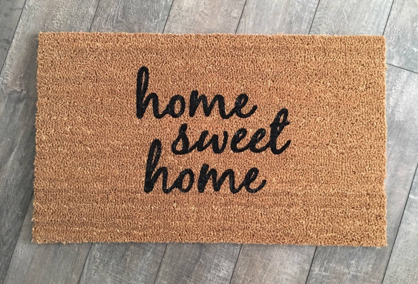 Home Sweet Home On Brown Rug Wallpaper