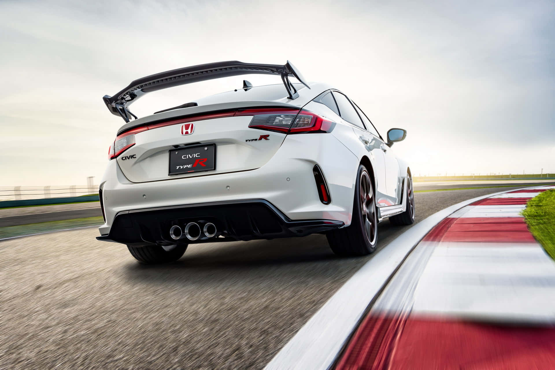 The 2019 Honda Civic Type R Is Driving On A Race Track Wallpaper