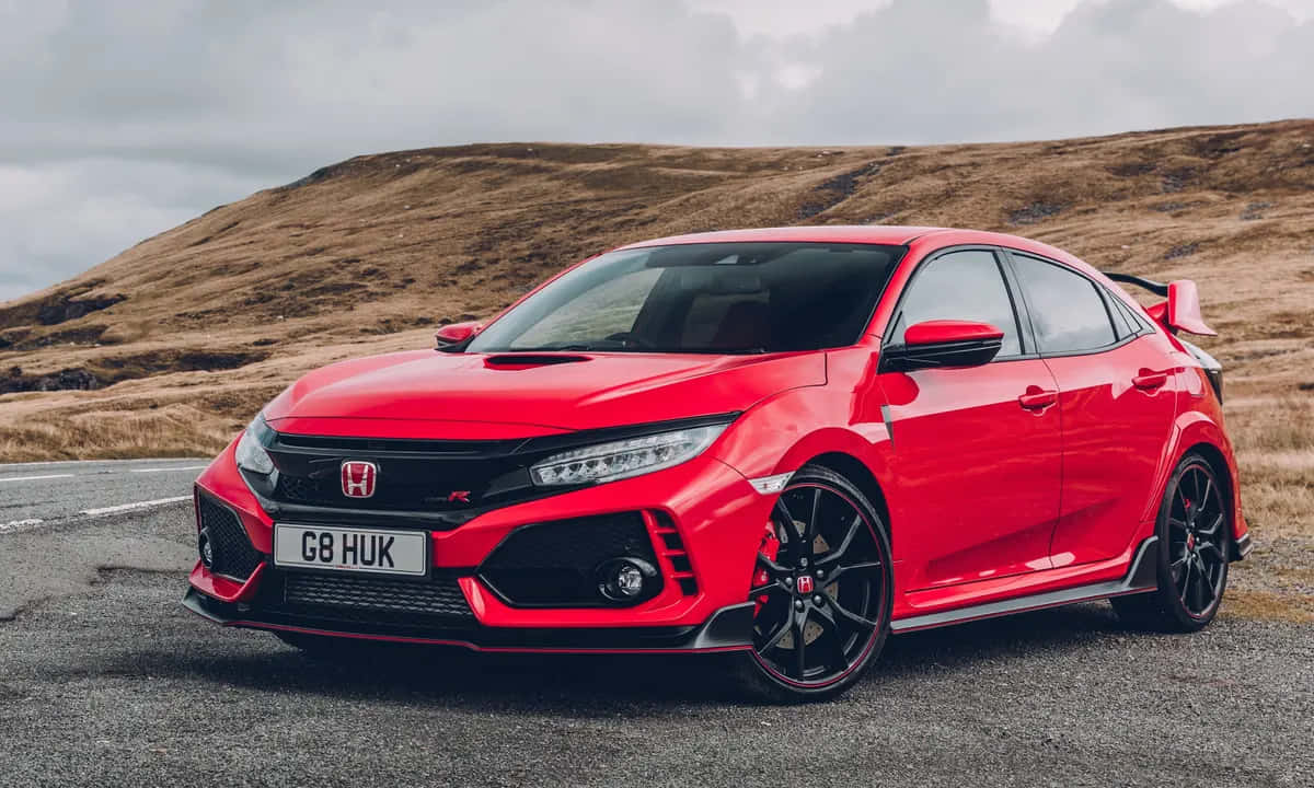 The Red Honda Civic Type R Is Parked On A Road Wallpaper