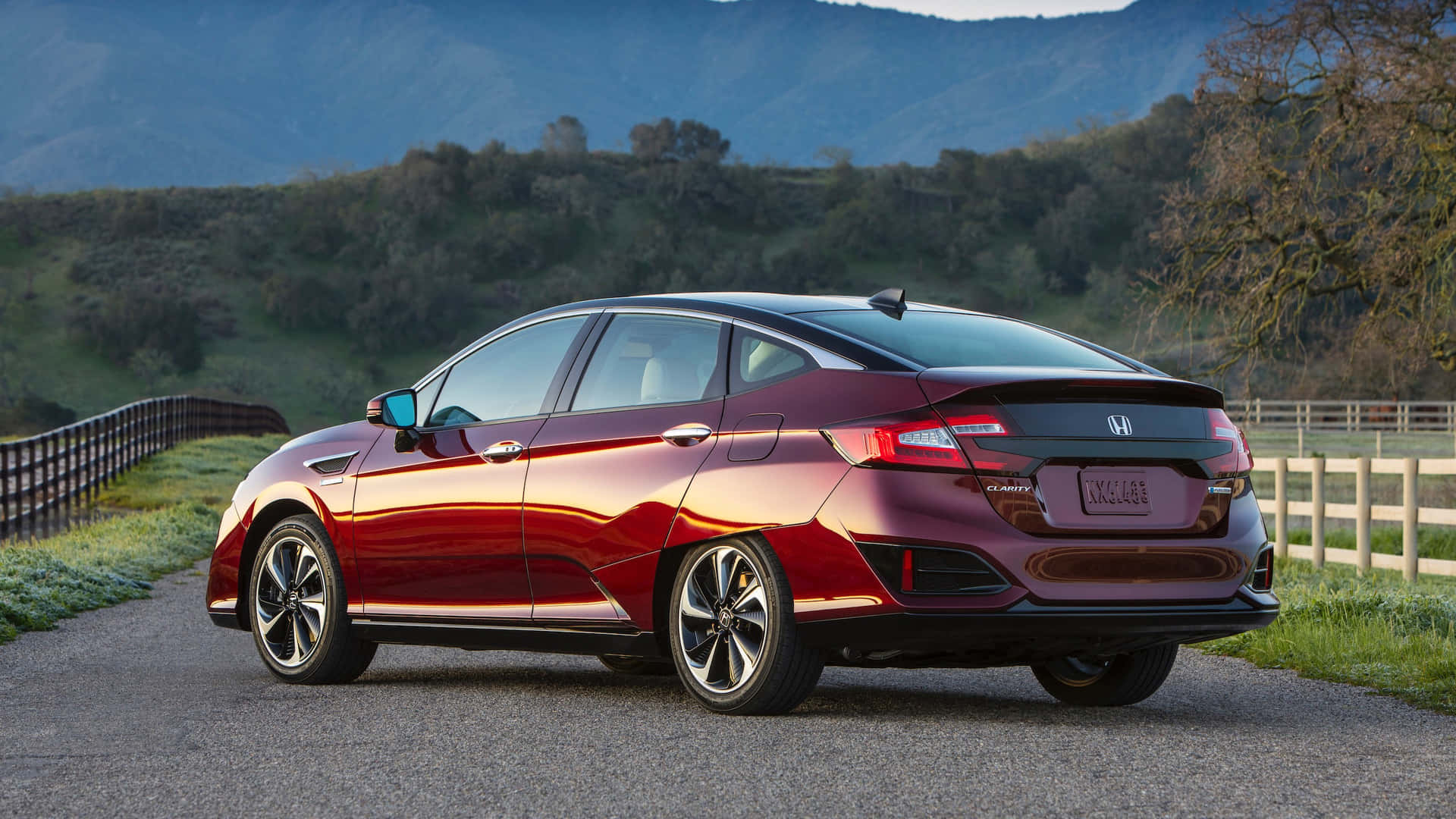 Sharp and sophisticated Honda Clarity on the road Wallpaper