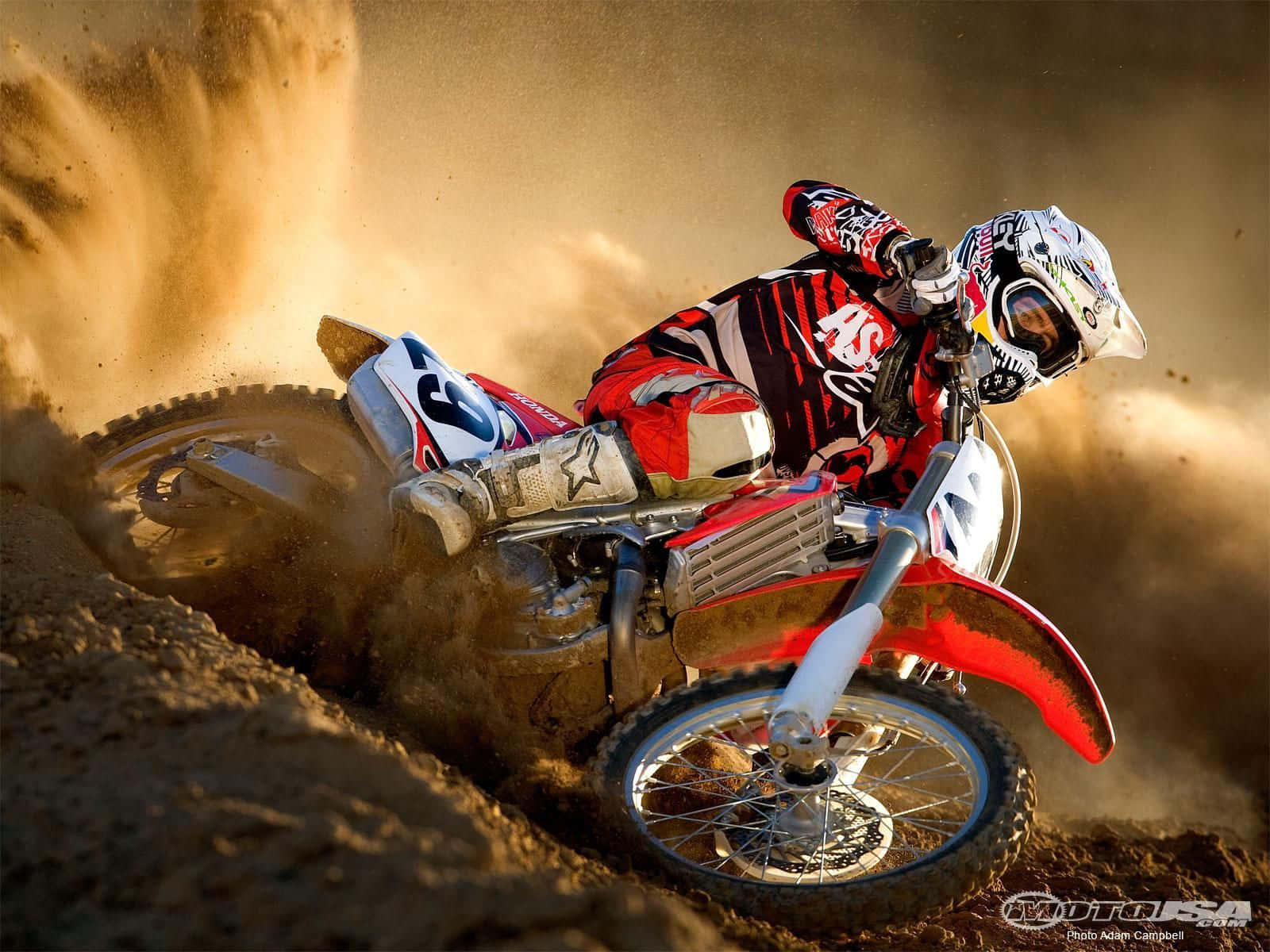 "Hop on this Honda Dirt Bike and hit the trails!" Wallpaper
