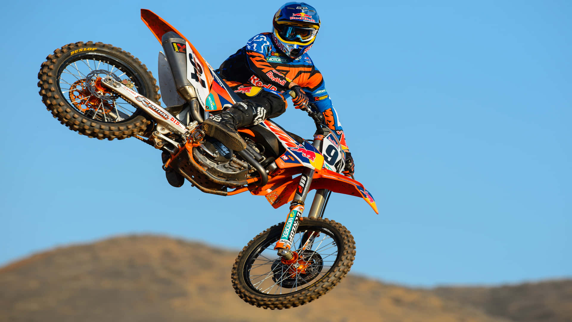 Ride the world with Honda's top-of-the-line dirt bike Wallpaper