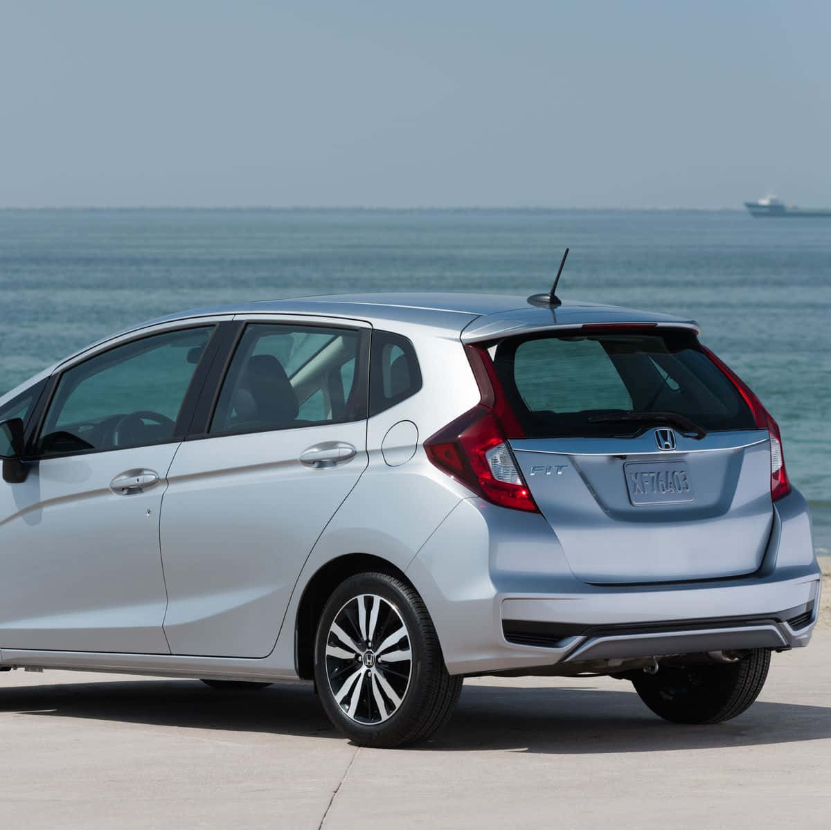 Sleek and Stylish Honda Fit in Action Wallpaper