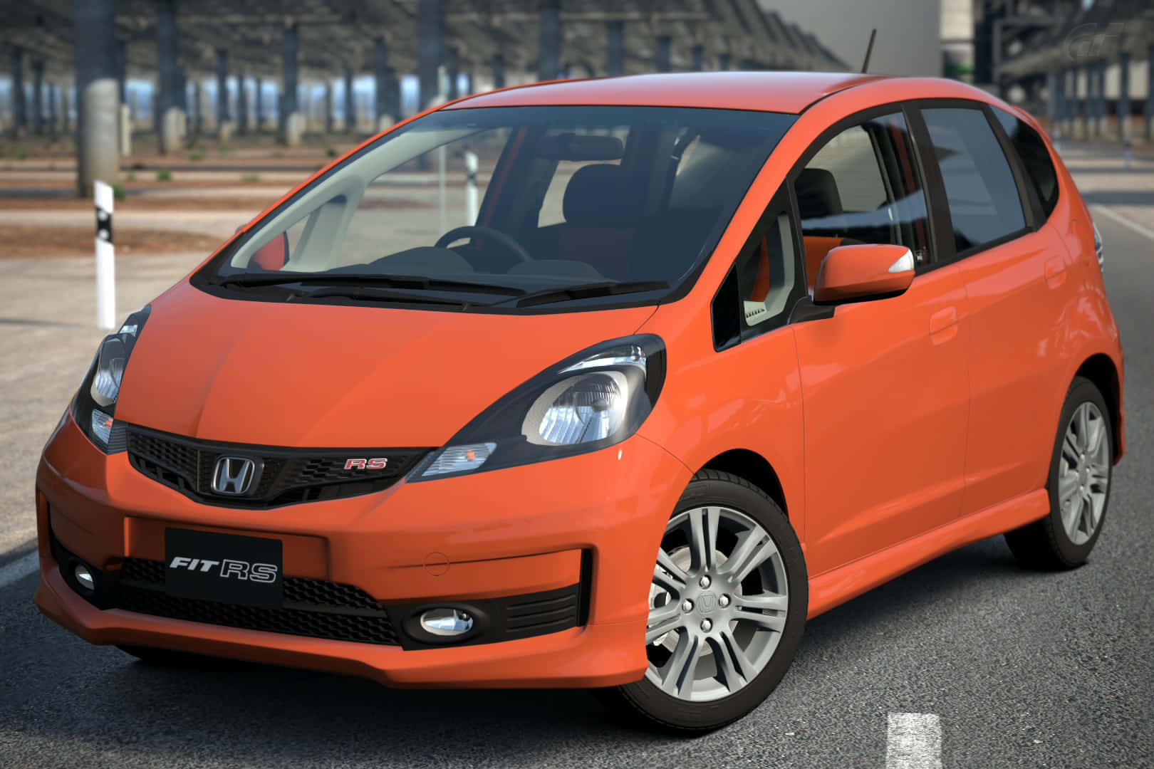 Sleek and Stylish Honda Fit on the Road Wallpaper