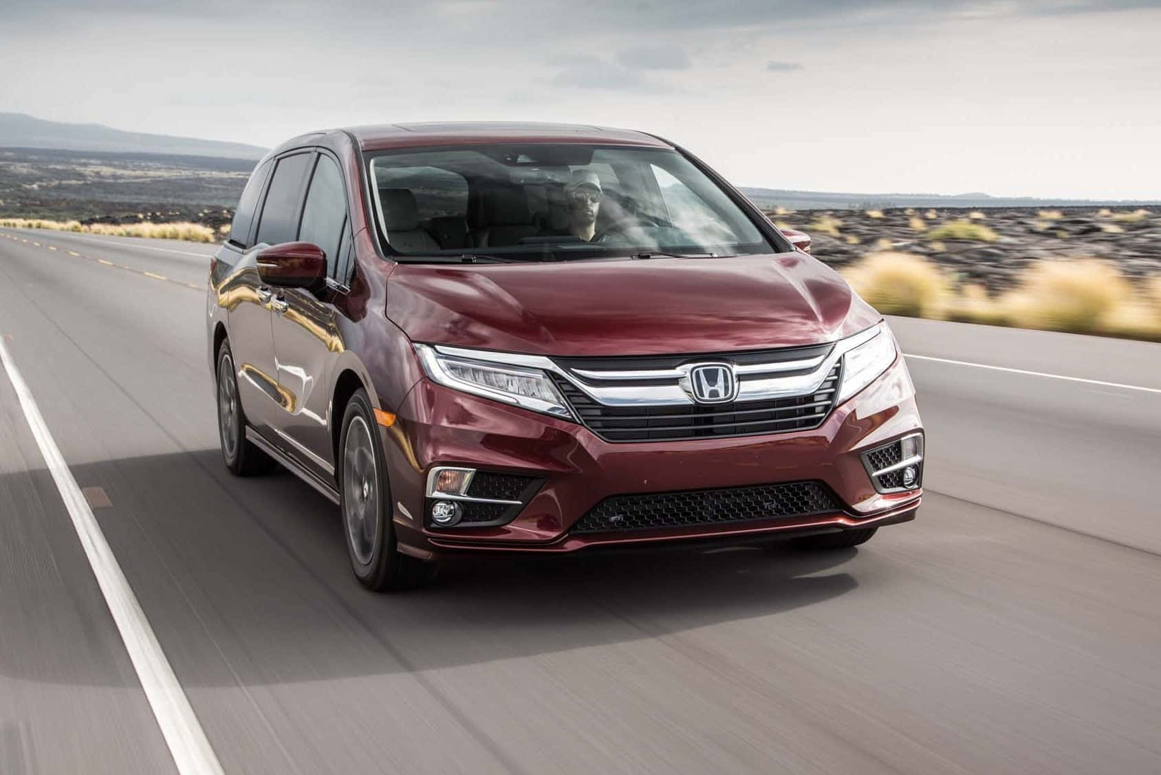 Sleek and Stylish Honda Odyssey Minivan Wallpaper