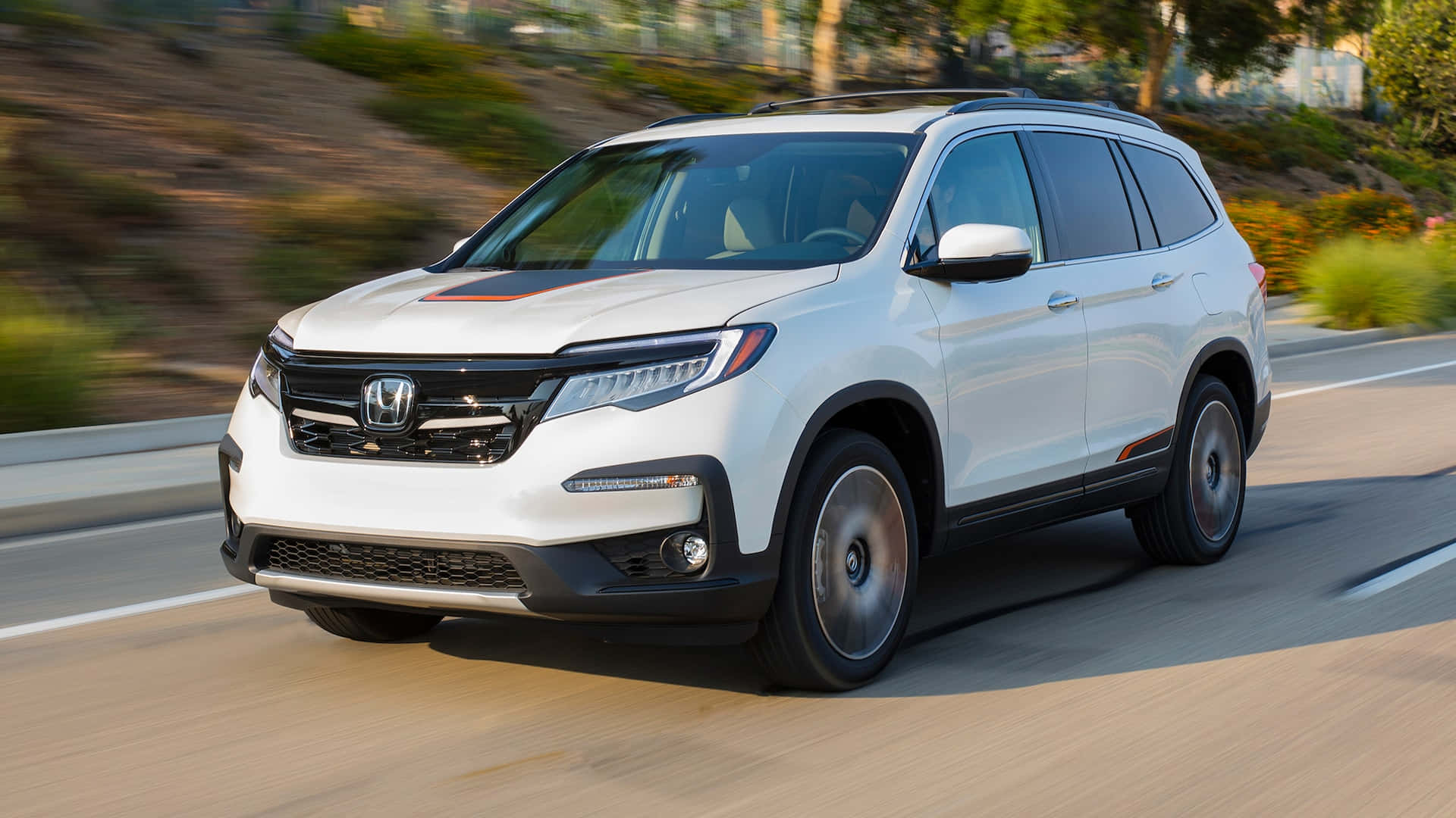 The 2019 Honda Passport Is Driving Down The Road