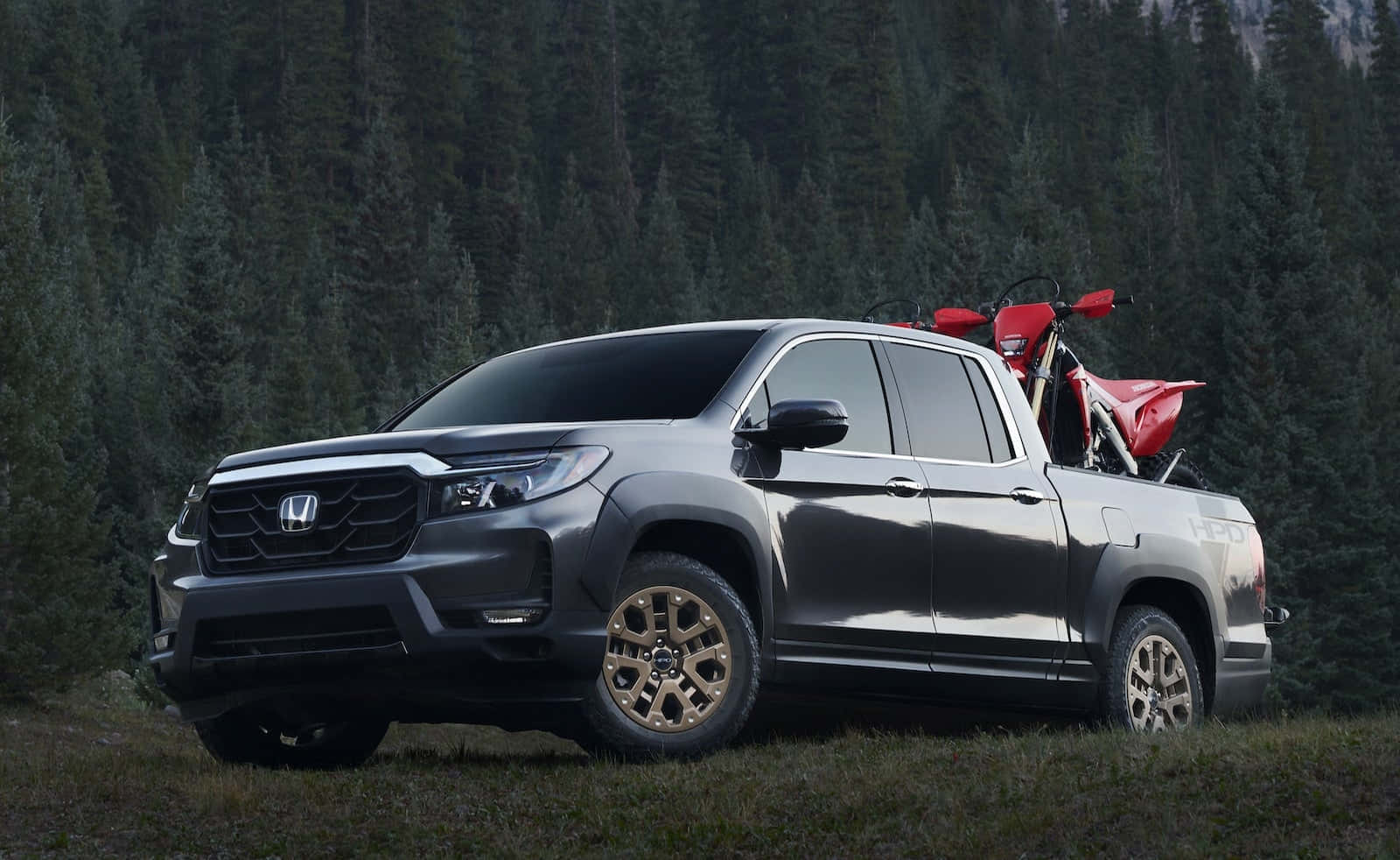 Sleek Silver Honda Ridgeline on a Scenic Driveway Wallpaper