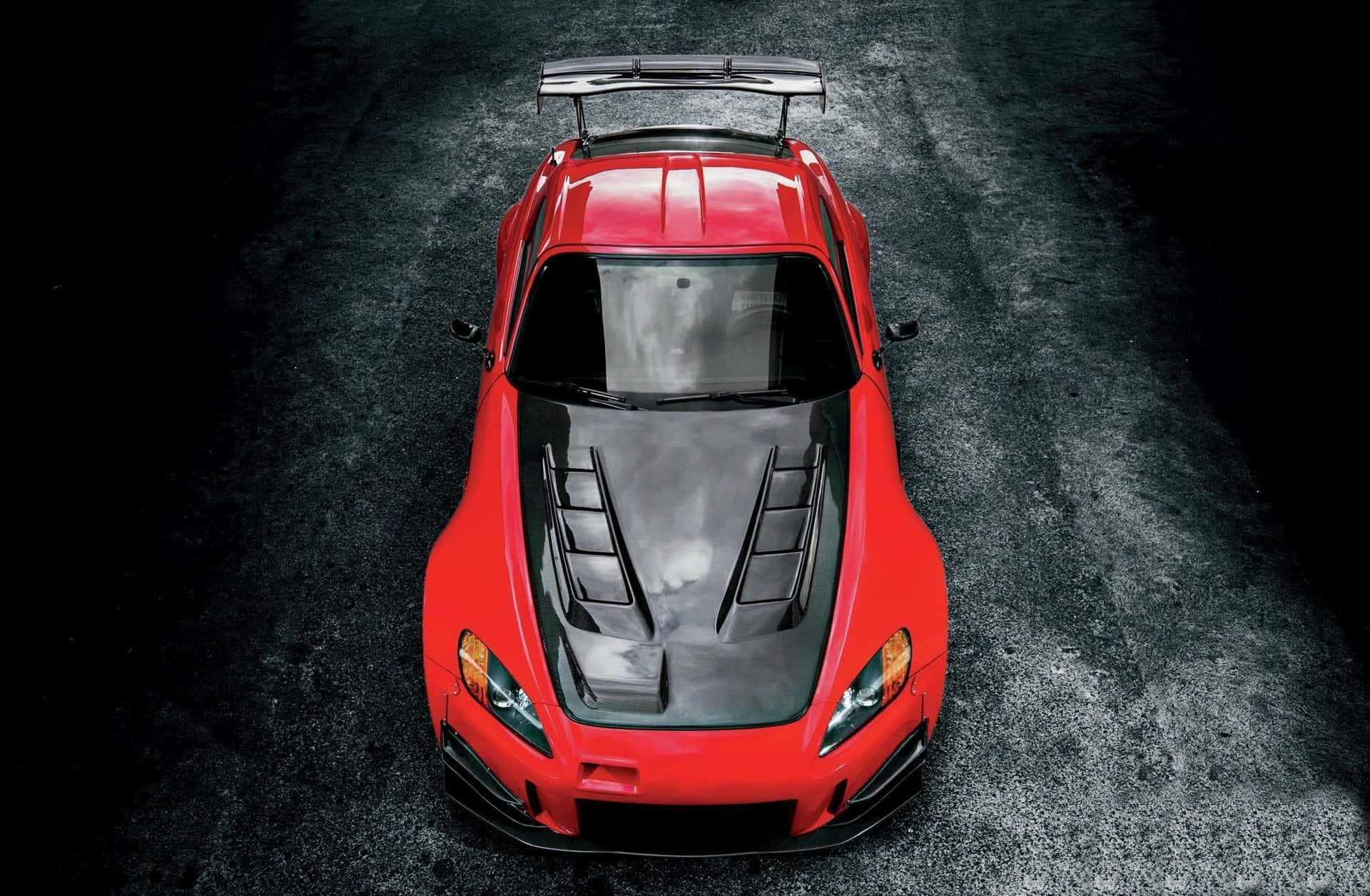 "Feel the power of the Honda S2000 - the world's most responsive sports car" Wallpaper
