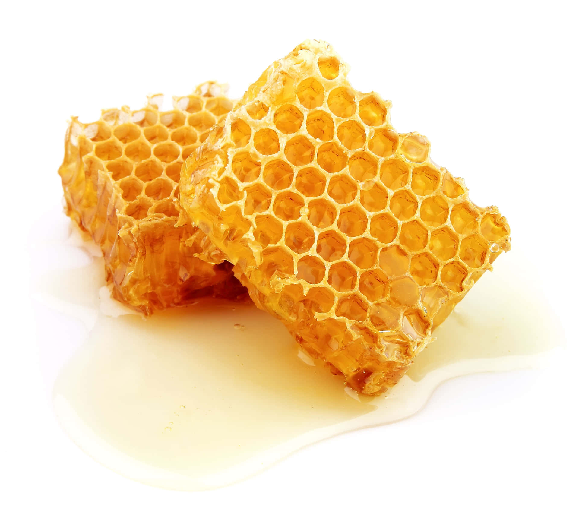 Honigwabenmit Honig Auf Einem Weißen Hintergrund.