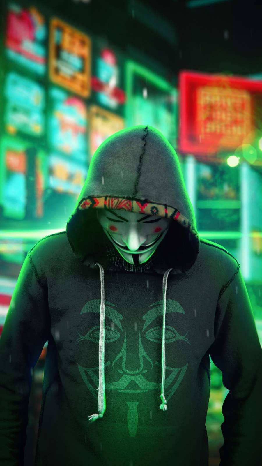 Mand iført hoodie med Guy Fawkes maske tegning på sort baggrund. Wallpaper