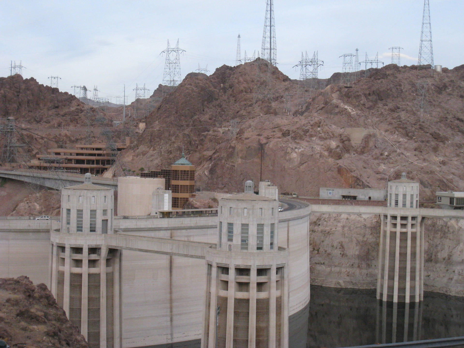 Majestic Hoover Dam Captured in Mid-day Brilliance Wallpaper