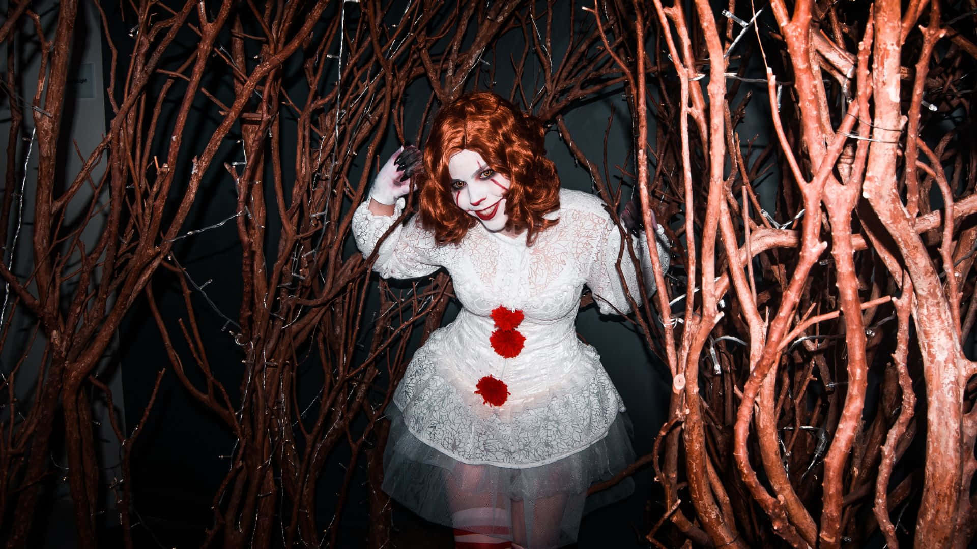 Express Your Darkest Nightmares With Spooky Horror Costumes" Wallpaper