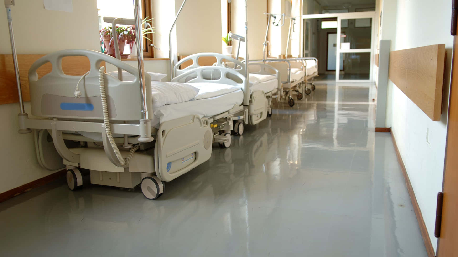 A Hospital Room With Beds