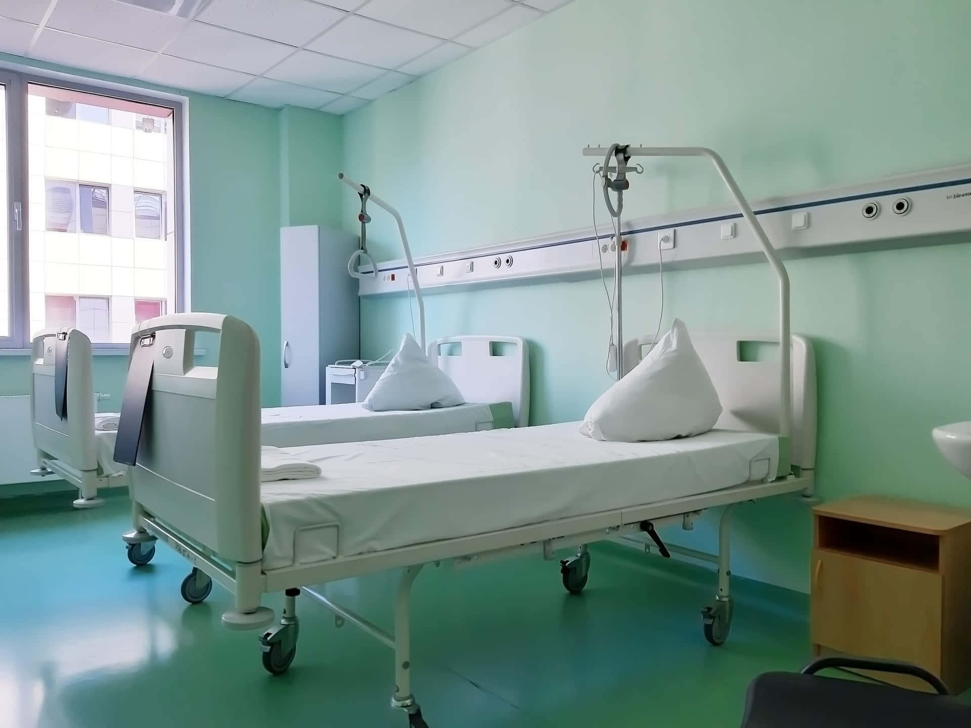 Hospital Room With Two Beds And A Sink