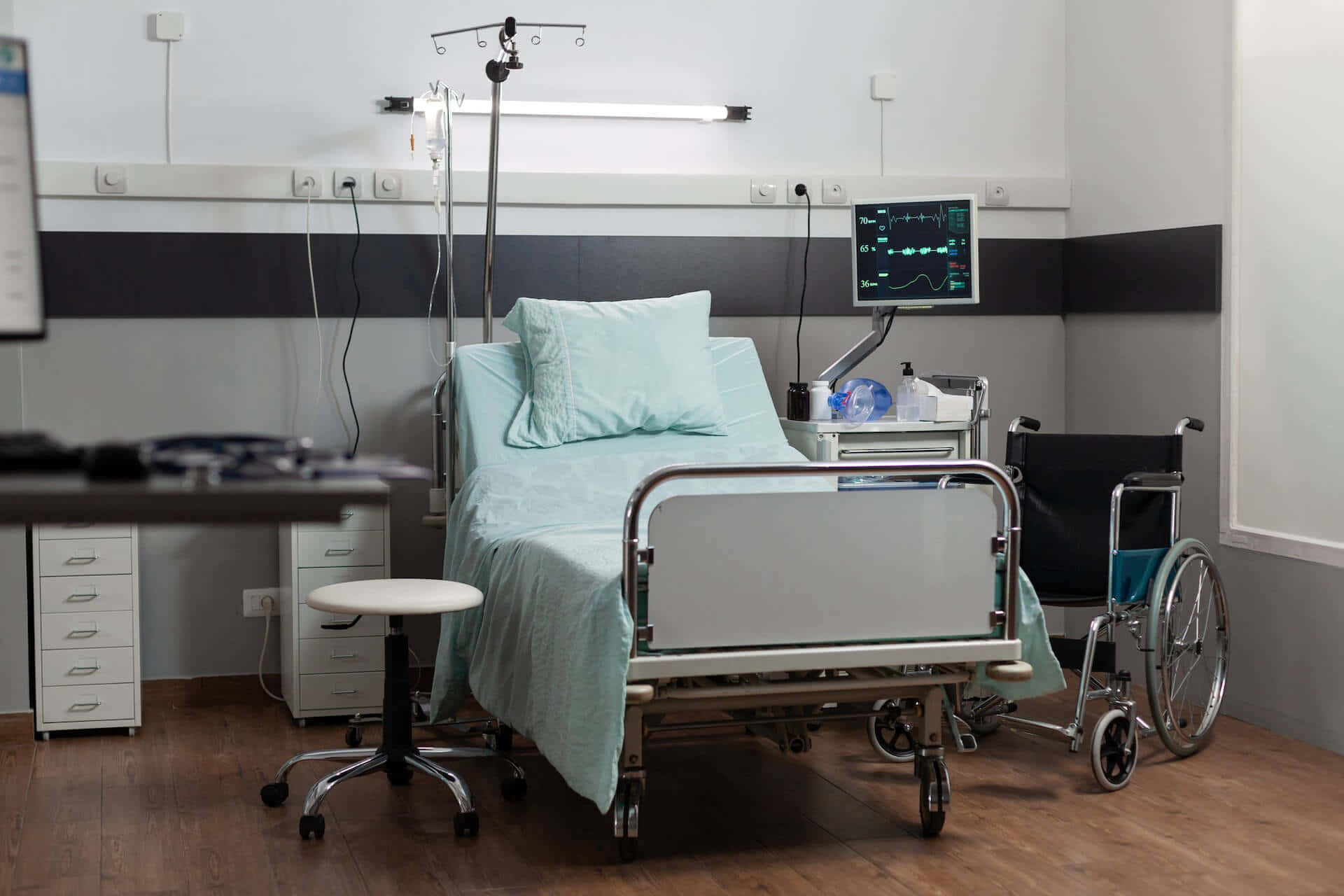 Hospital Bed With Wheelchair Wallpaper