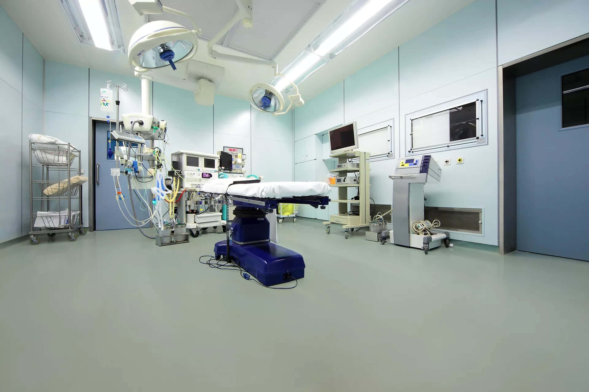 A Hospital Room With A Machine And Equipment