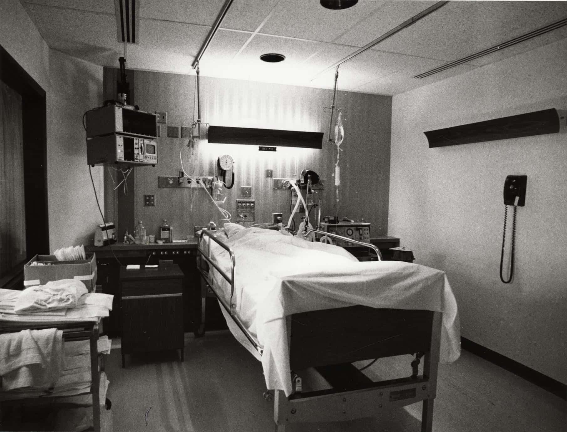 A Hospital Room With A Bed