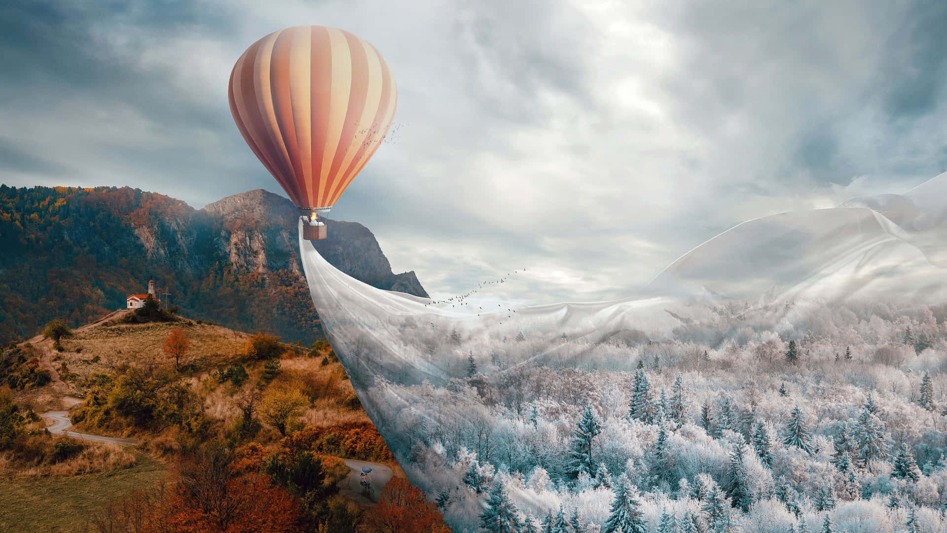 A Hot Air Balloon Flying Over A Mountain