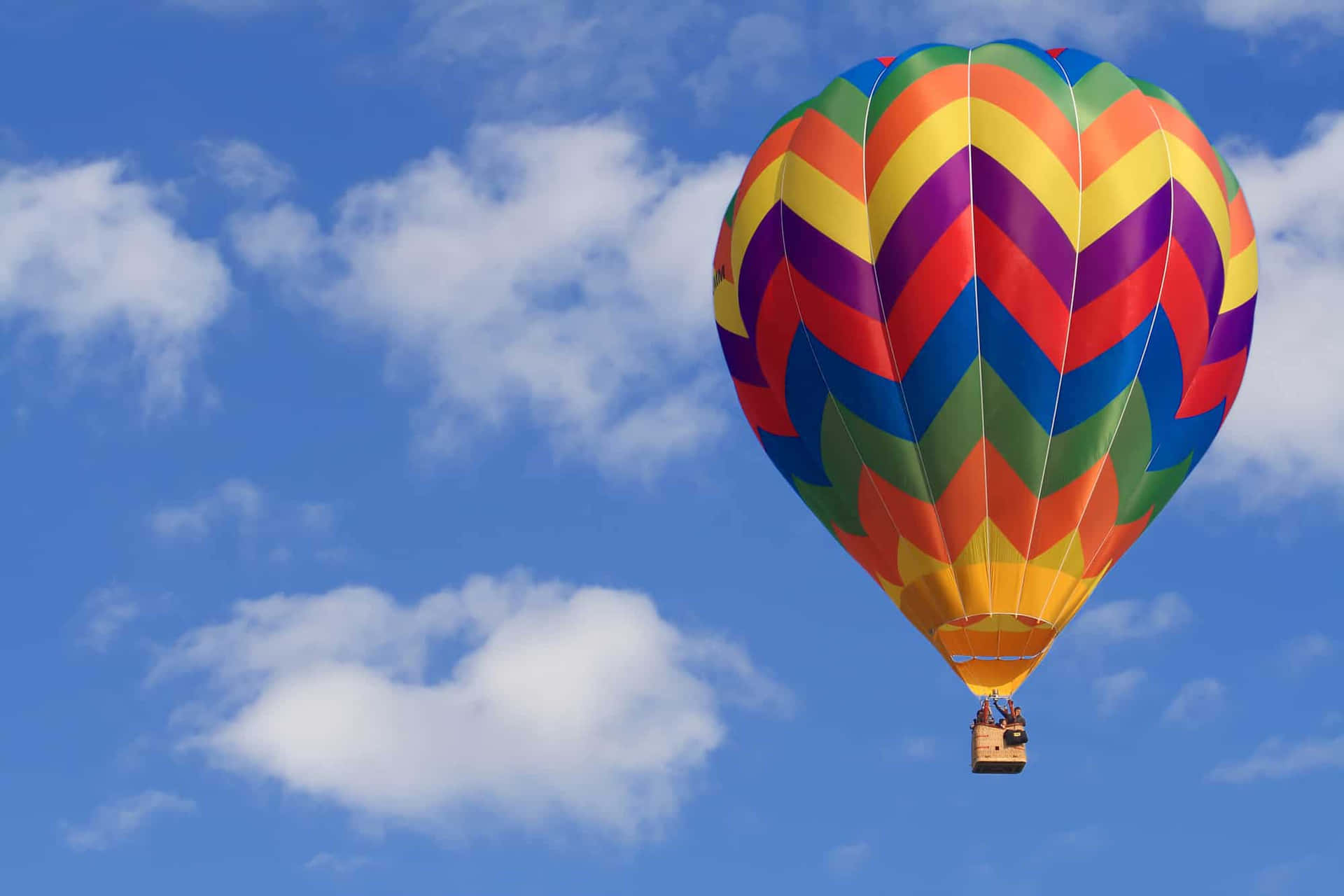 A Colorful Hot Air Balloon Flying In The Sky